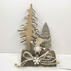 Decorazione natalizia su tronco con glitter